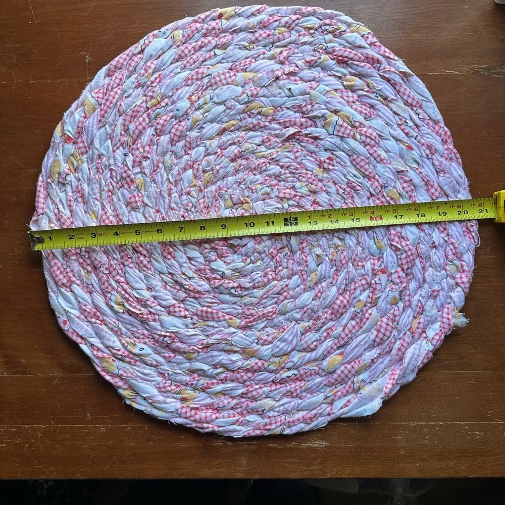 Round Pink and White Braided Rug